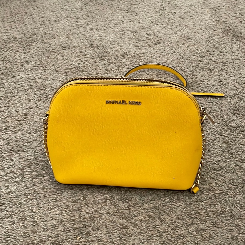 This is a yellow Michael Kors purse